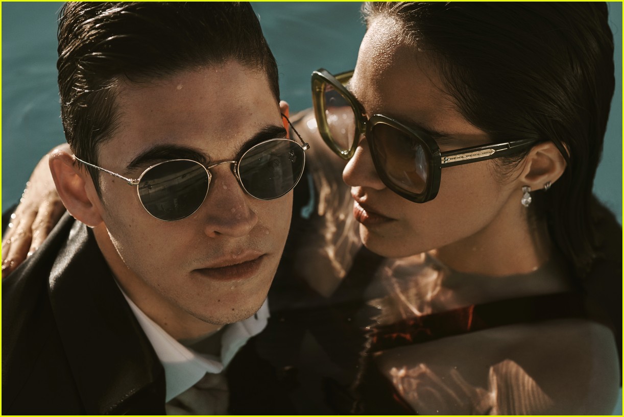 Hero Fiennes-Tiffin has his eyewear examined by a friend in a campaign photo for Oliver Peoples.