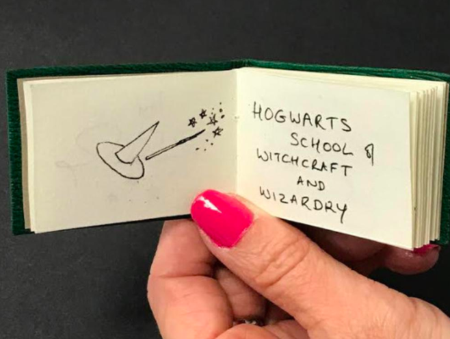 One of the doodles in the book features a wizard’s hat and wand.