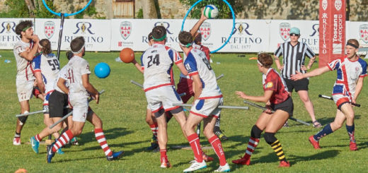 Pictured is a quidditch match between a UK team vs. a team in red-and-white jerseys.