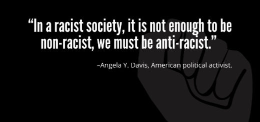 The quote by Angela, that be non racist isn't enought, we must be anti racist. Black background, white words.