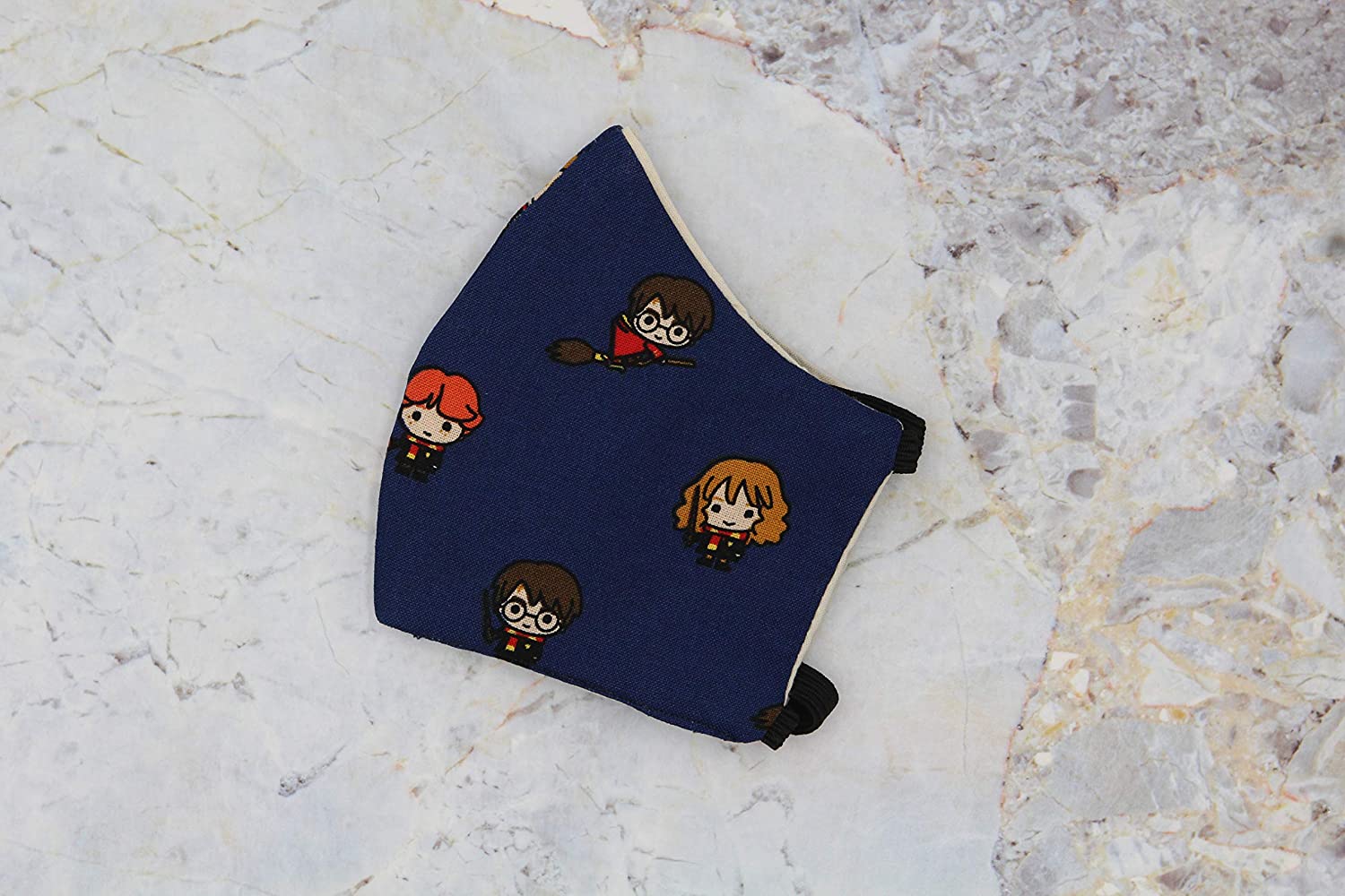 face mask with chibi Harry, Ron, and Hermione print on navy material