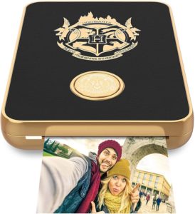 A hand-held photo printer with the Hogwarts crest on it. 