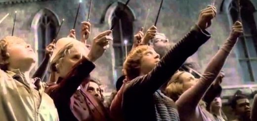 The students of Hogwarts memorialize Dumbledore's death by raising their wands to the sky