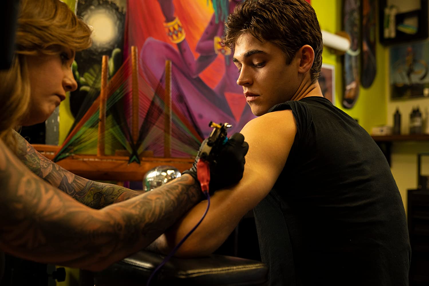 Hero Fiennes-Tiffin gets tatted up in “After We Collided”. (Credit: Open Road Films)