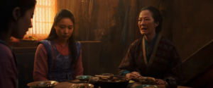 Hua Li and Mulan sitting at a table