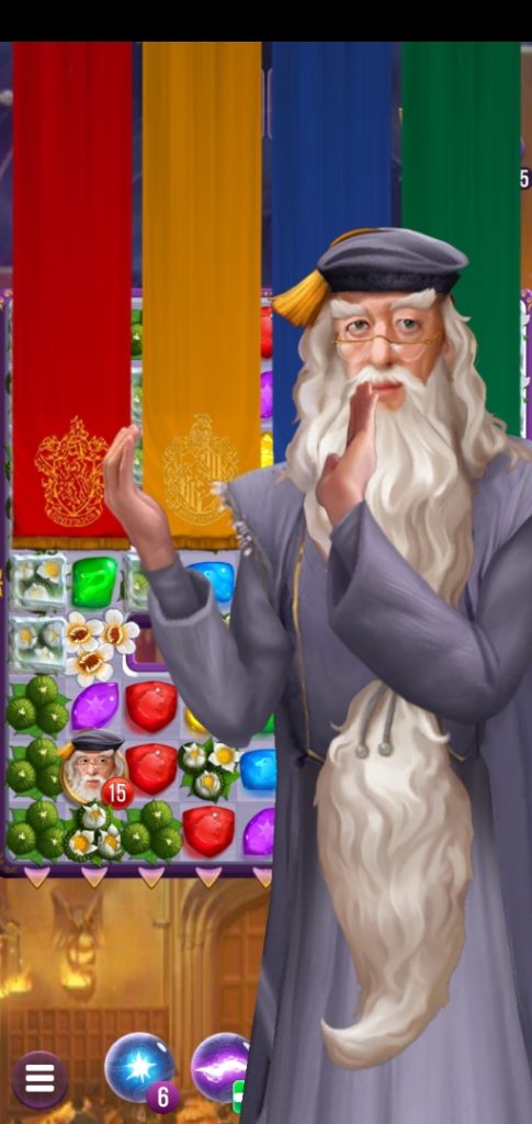 Dumbledore claps his hands in a screenshot from "Harry Potter: Puzzles & Spells".