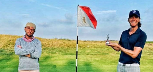 Tom Felton and James Phelps pose on a golf course.