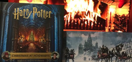 Christmas at Hogwarts book near a (fake) fireplace