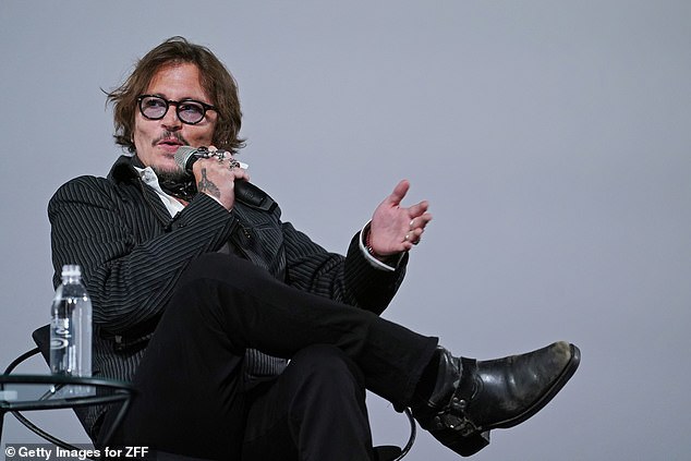 Johnny Depp kicks back at the Zurich Film Festival.