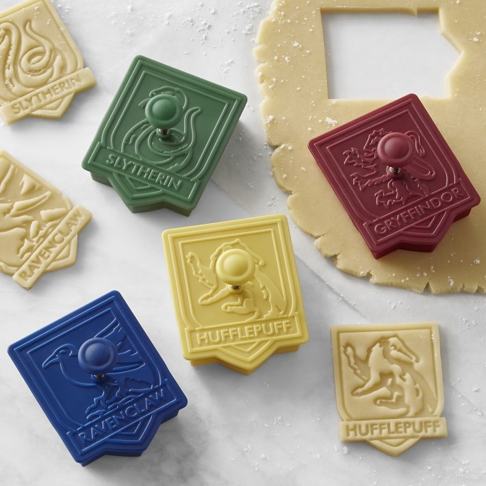 Pictured is a set of Hogwarts House-themed cookie cutters from Williams Sonoma.