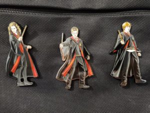FiGPiN® Harry Potter Wave Package clipped onto bag