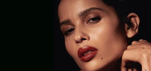Zoë Kravitz modeling a shade of lipstick from her new lipstick collectionRouge Pur Couture x Zoë Kravitz.