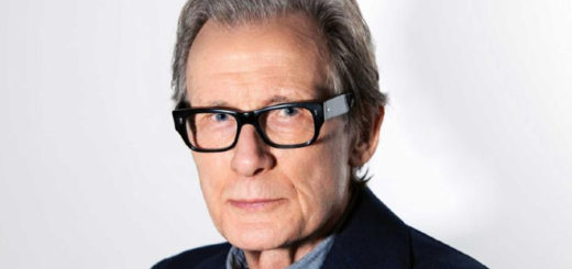 Billy Nighy wearing glasses