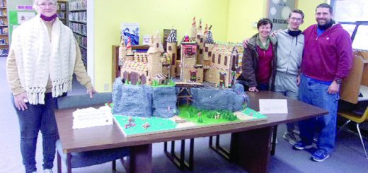 A graham cracker model of Hogwarts castle built by a father and son in Illinois is on display at their local library in New Baden.