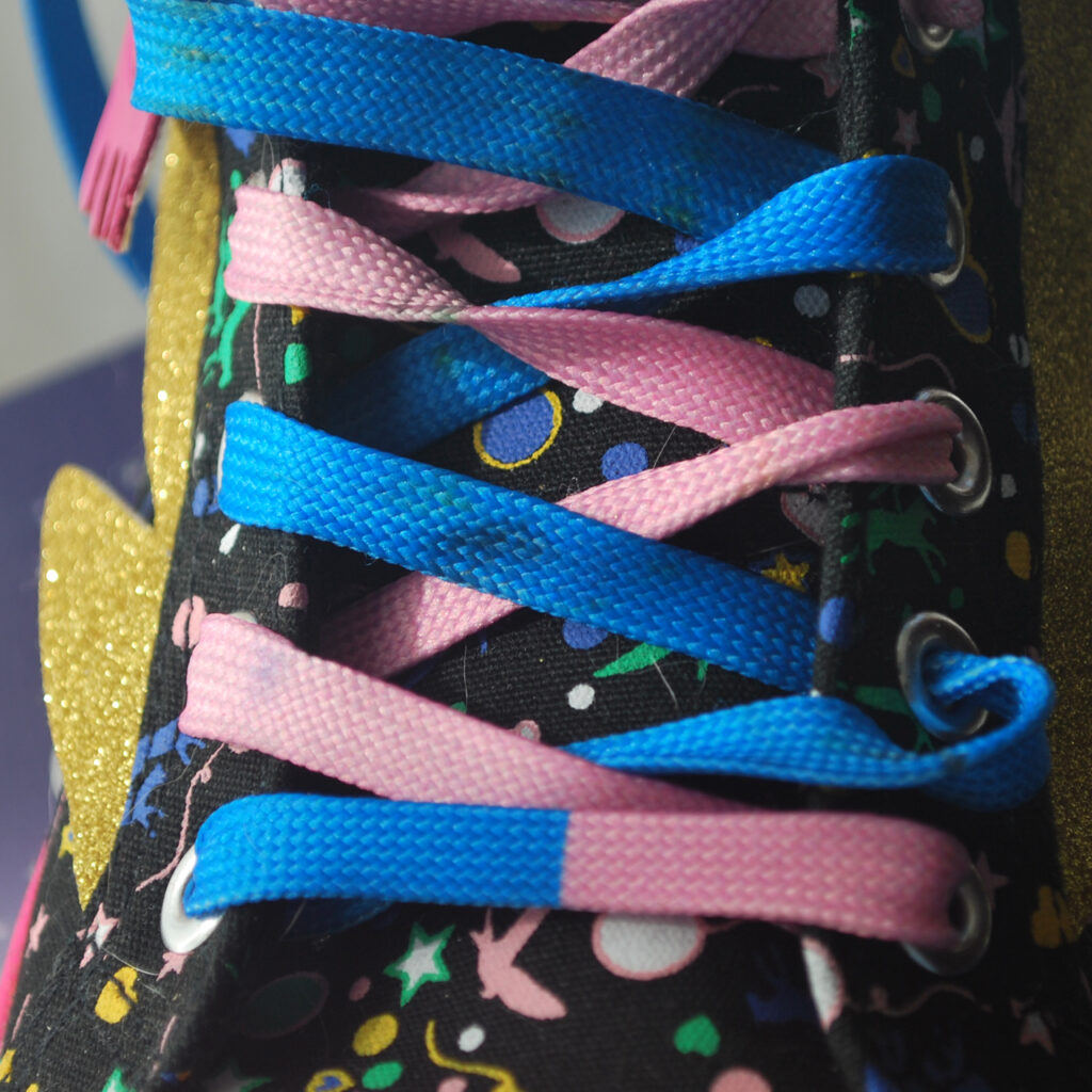 Close up of the Luna Lovegood shoes highlighting the different colors of the laces