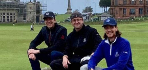 Tom Felton, James and Oliver Phelps waiting to tee off on the golf course.