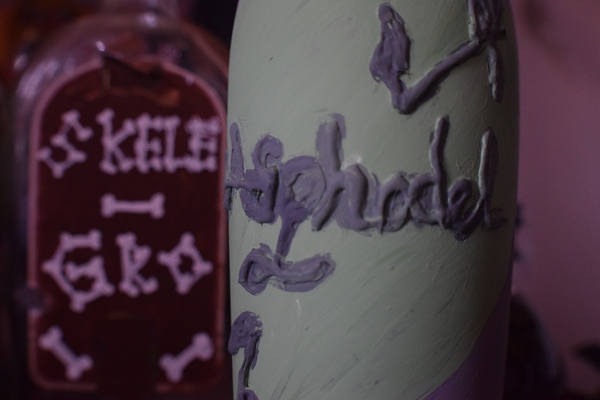 DIY potion bottle painting the bottles