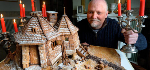 "The Great British Bake-Off"'s Terry Hartill poses with a gingerbread Hagrid's Hut he was commissioned to create.