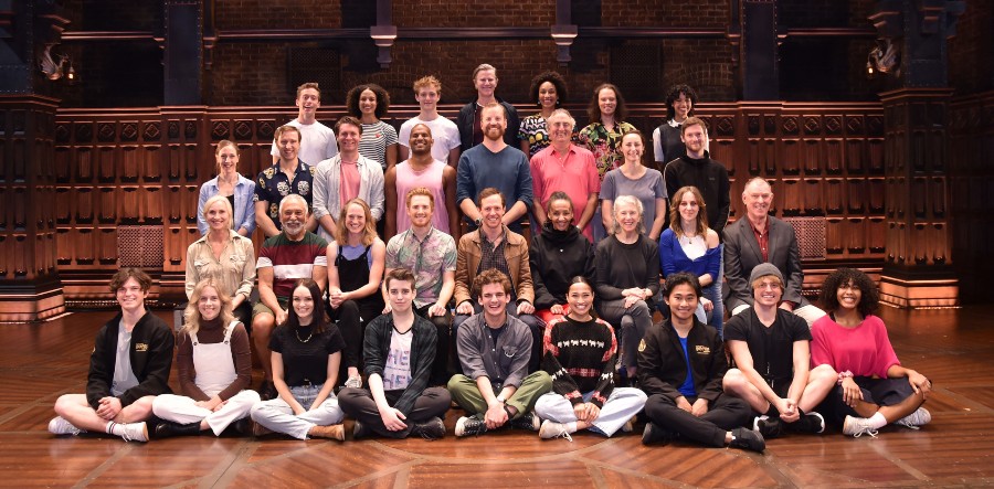 A group photo of the full Australian company of Cursed Child on the stage of Princess Theatre.