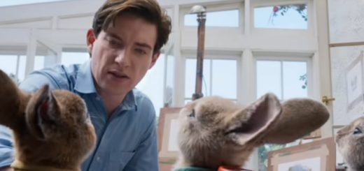 Domhnall Gleeson (Bill Weasley) appears in character in a screen capture from the trailer for "Peter Rabbit 2," conversing with CGI rabbits.