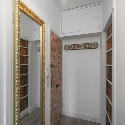 This magical "Potter" Airbnb in Edinburgh has a hidden cupboard behind a mirror and a hidden bedroom behind a bookcase.