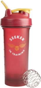 The Harry Potter BlenderBottle V2 Shaker Bottle, 28 oz - Seeker in Training - Gryffindor Quidditch Colors is pictured as sold on Amazon.
