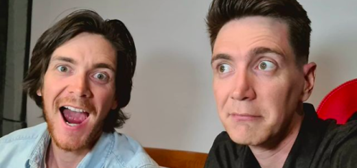 An image of James and Oliver Phelps. James is facing the camera with a wide expression, while Oliver looks slightly away looking concerned.