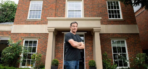 Jason Isaacs stood in front of the mansion that is up for raffle for Great Ormond Street Hospital