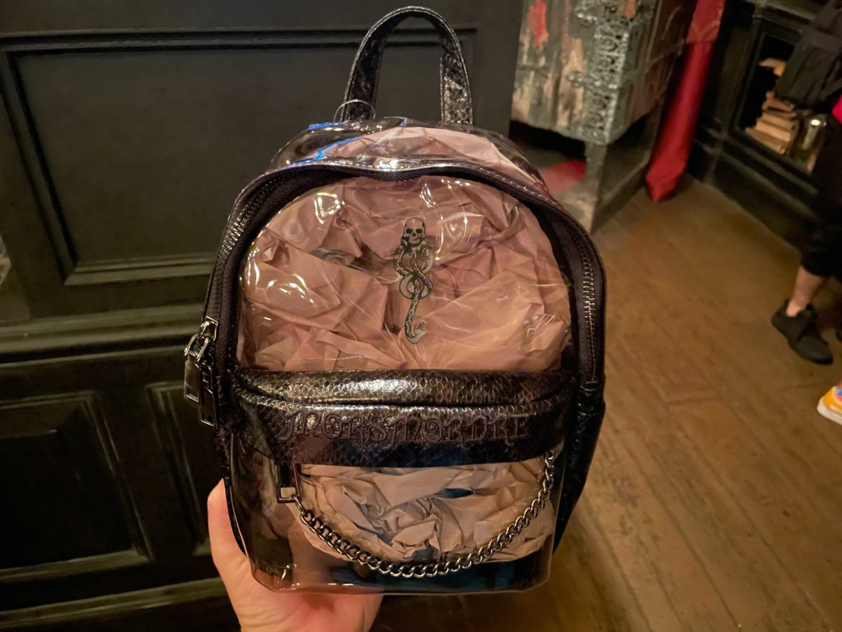 The mini backpack has a Dark Mark on the front.