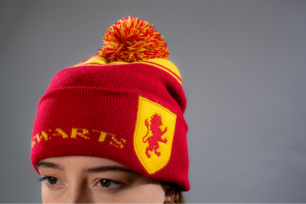 Gryffindor shows its pride with House beanie in bright red and gold colors.