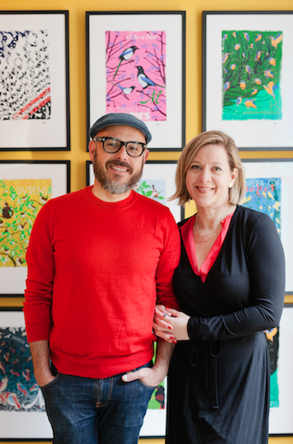 Eduardo Lima and Miraphora Mina pose in front of their Collective Nouns Collection