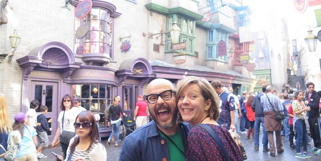 Eduardo Lima and Miraphora Mina are pictured smiling in Diagon Alley at Universal Orlando Resort