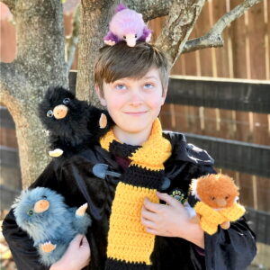 PotterKid surrounded by Nifflers.