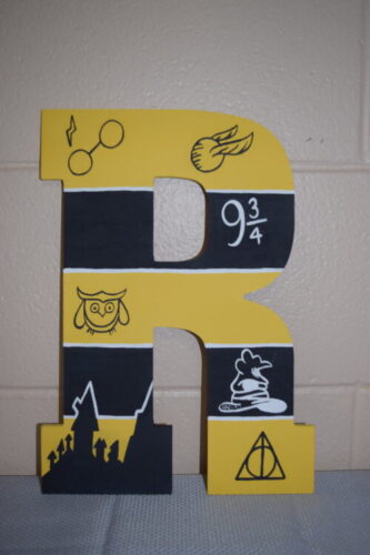 Hufflepuff art created by Rachel.