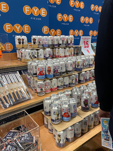 These cartoon soda cans could be found in the showroom of NYCC 2021.