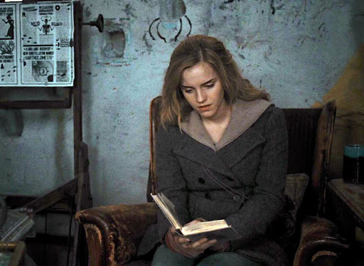 This is a picture of Hermione reading.