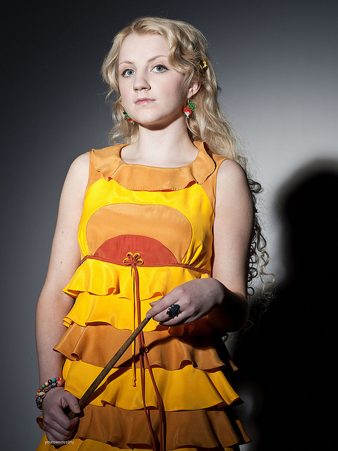 Luna Lovegood wears a yellow dress.