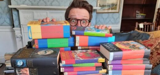 Jim Spencer poses with Harry Potter books.