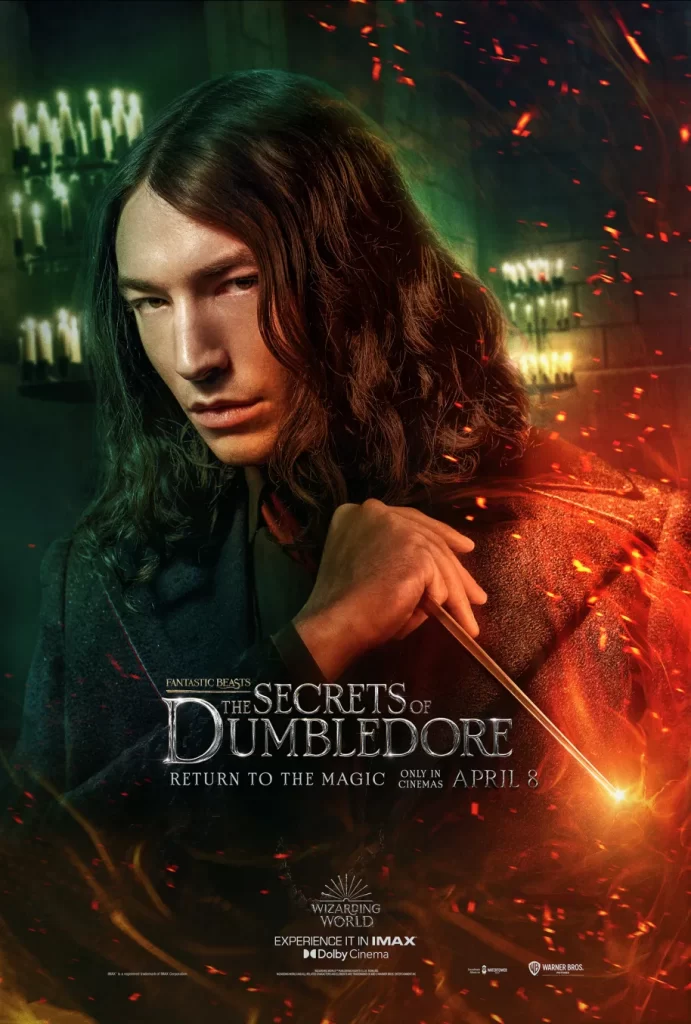 Poster of Credence Barebone from Fantastic Beasts: The Secrets of Dumbledore. Credence has shoulder-length hair and holds a wand with orange light at the tip.