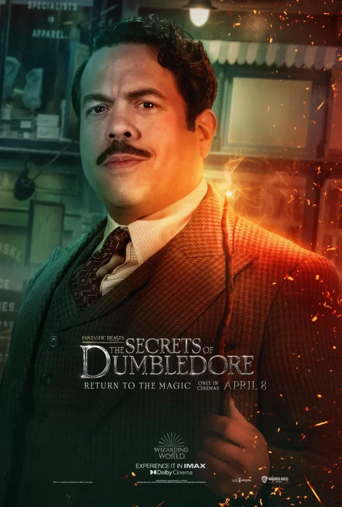 character poster for Jacob Kowalski from Fantastic Beasts: The Secrets of Dumbledore. Jacob holds a wand with orange light coming out of it.