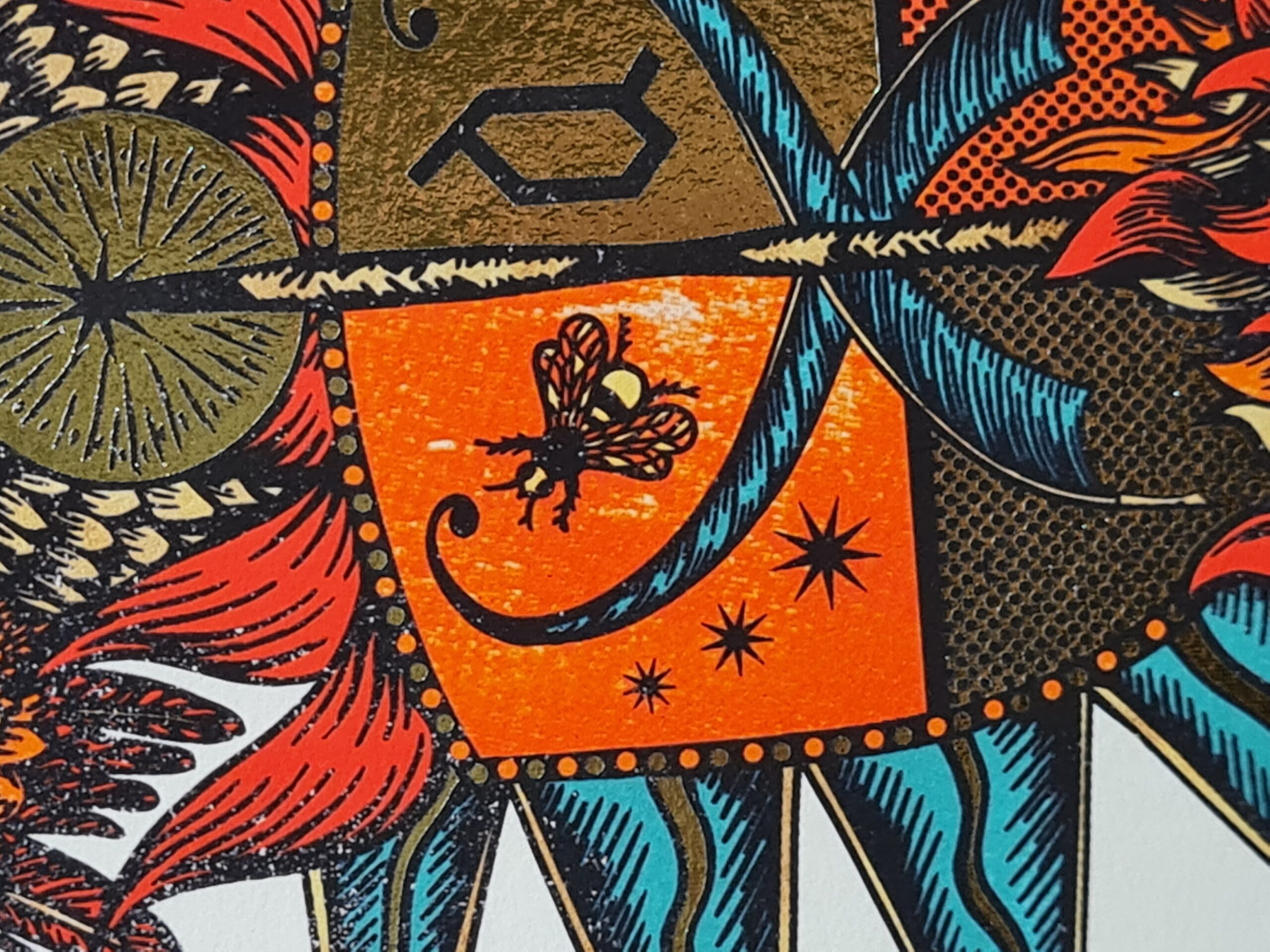 Bumblebee detail on Dumbledore insignia designed by MinaLima.