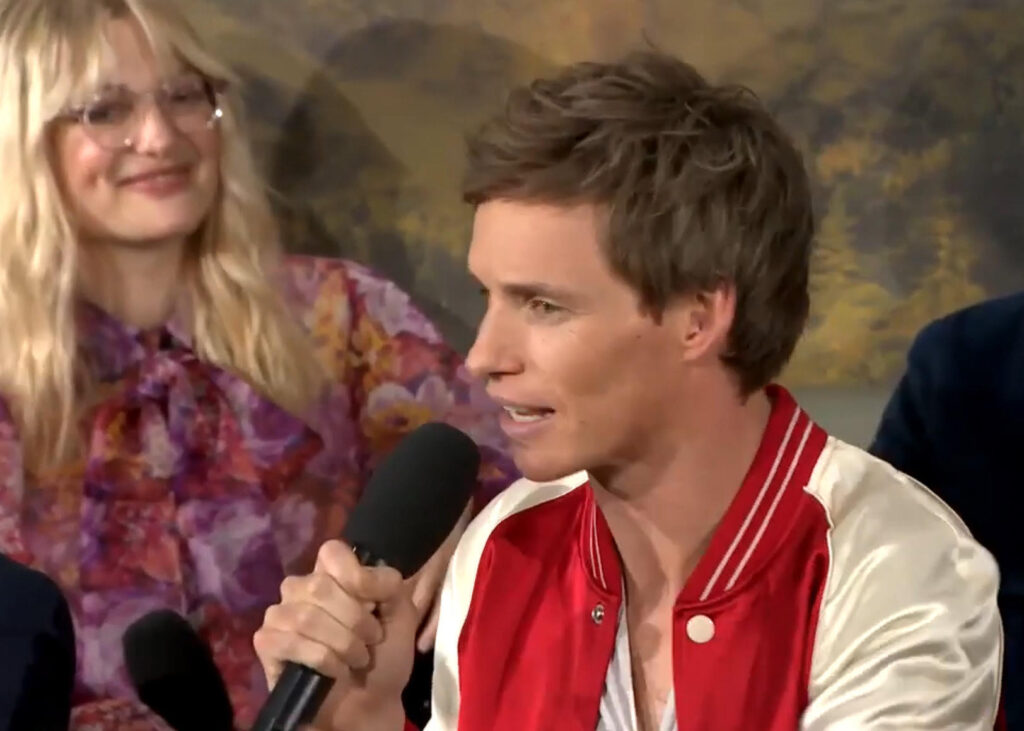 Eddie Redmayne speaks at the Secrets of Dumbledore press conference.