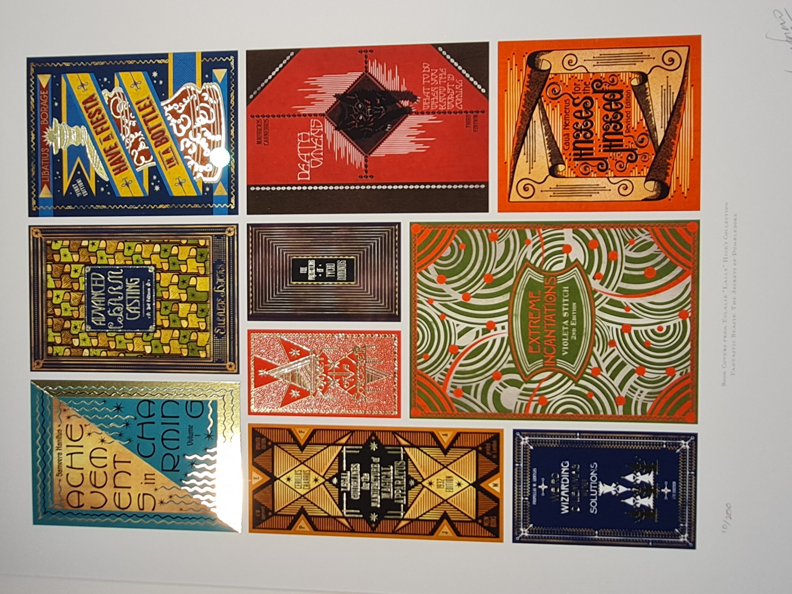 Covers of spellbooks owned by Professor Eulalie “Lally” Hicks designed by MinaLima for “Fantastic Beasts: The Secrets of Dumbledore.”