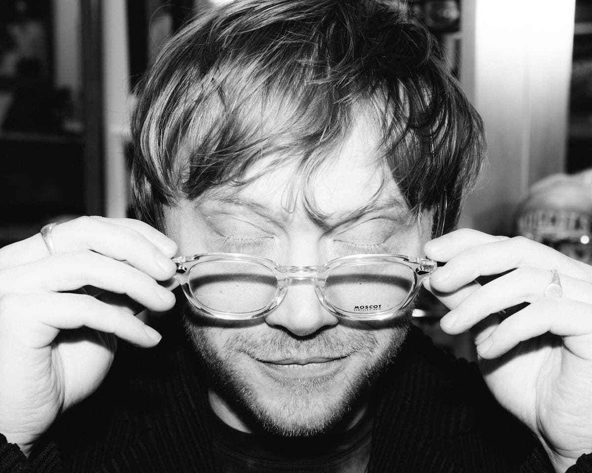 Rupert Grint Trying on glasses