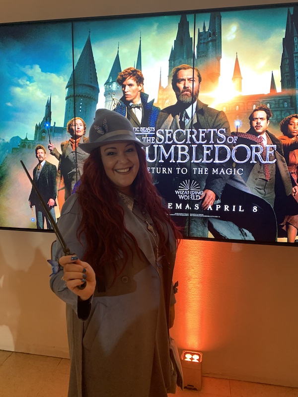 A fan dressed as a Beauxbaton student at "the premiere of "Fantastic Beasts: The Secrets of Dumbledore".