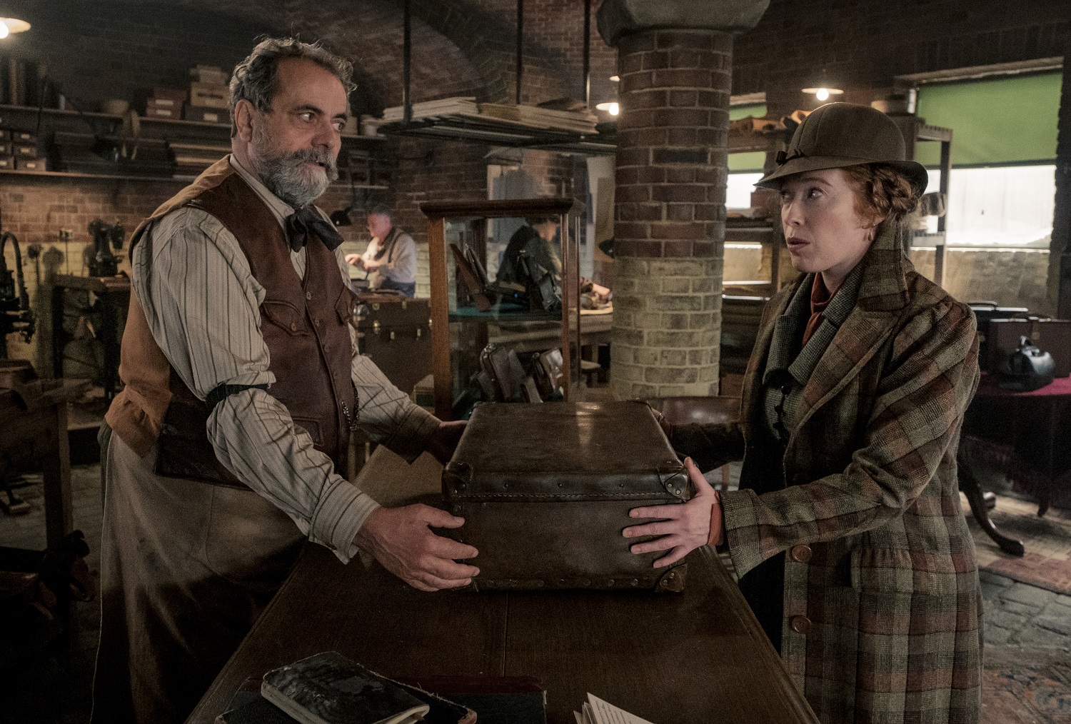 (L-R) MATTHIAS BRENNER as Otto and VICTORIA YEATES as Bunty in Warner Bros. Pictures' fantasy adventure "FANTASTIC BEASTS: THE SECRETS OF DUMBLEDORE,” a Warner Bros. Pictures release.