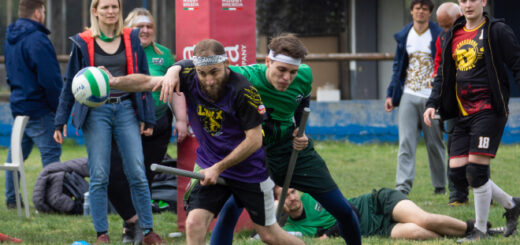 There is one chaser holding quaffle and one chaser from Brno Banshees who is trying to stop him.