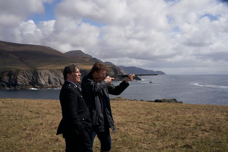 Ciaran Hinds and Liam Neeson in "In the Land of Saints and Sinners".