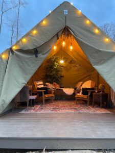 Tent for outdoor seating at Airbnb the Alchemy