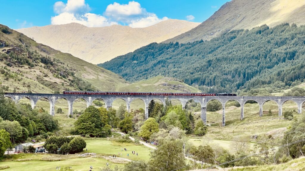 The Hogwarts Express rides over the Glennfinnan viaduct.